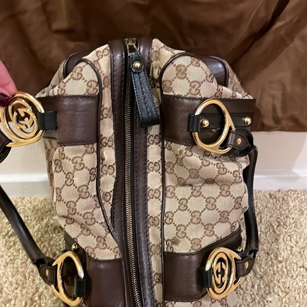 Gucci GG canvas Boston bag with brown and black leather and gold hardware. - Picture 9 of 10